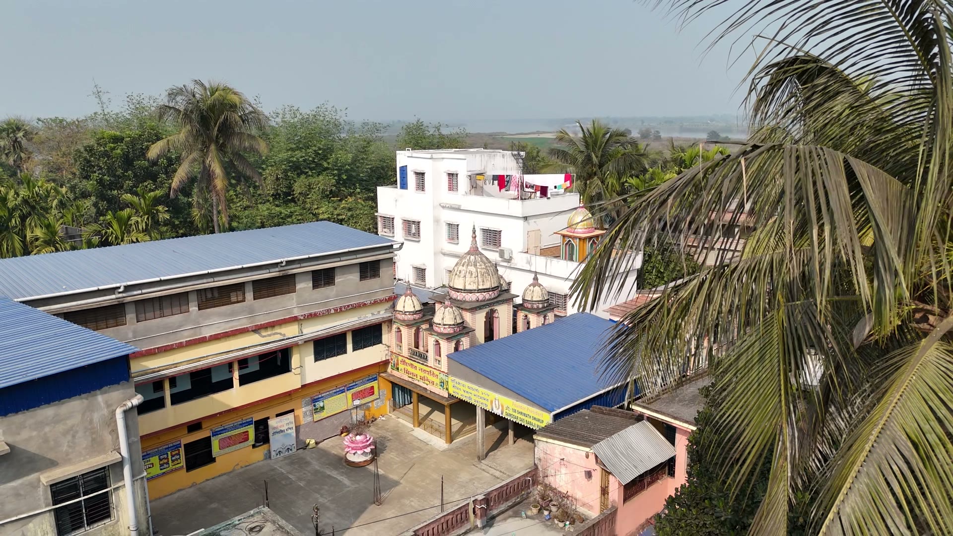 Drone aerial of temple and 60ft Gouranga