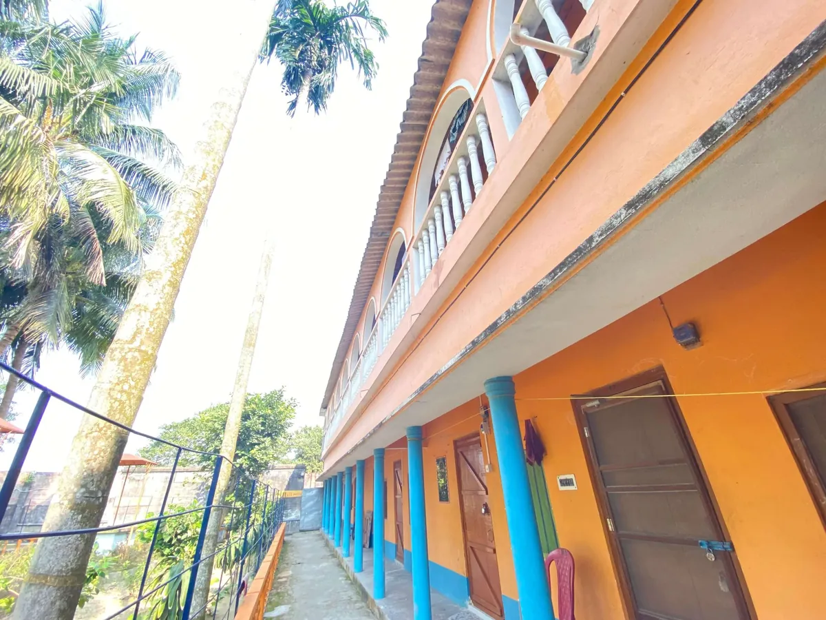 Comfortable guest room at Narahari Dham